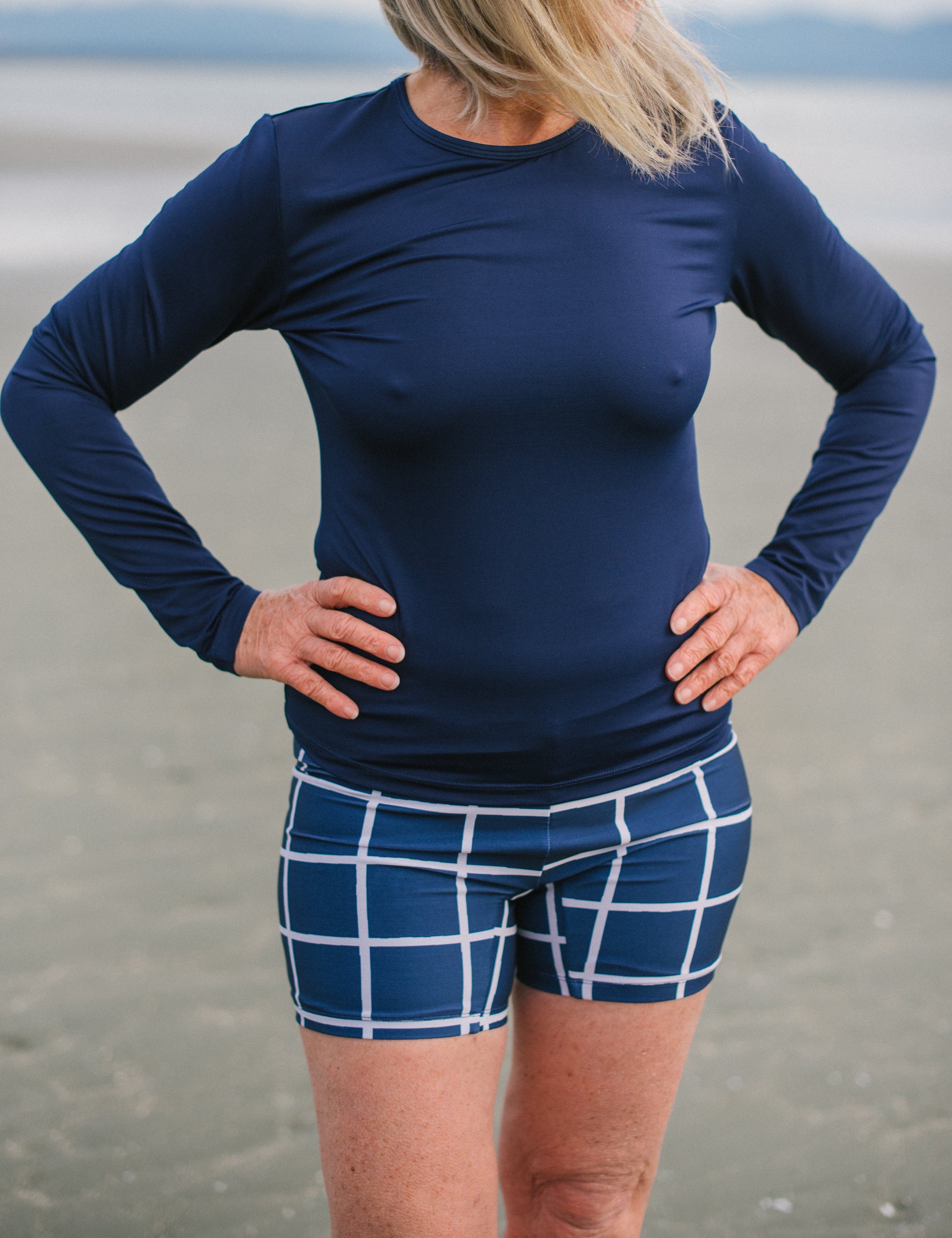 UPF 50+ Navy Saros swim short front arms 2